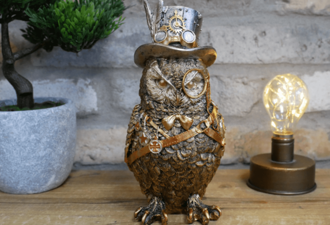 golden owl with steampunk top hat