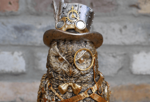 golden owl with steampunk top hat