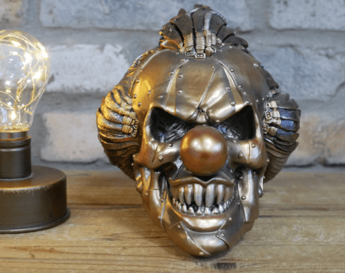 Bronze and gold resin clown skull