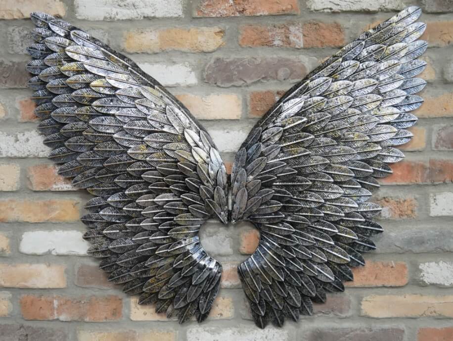 Large silver angel wings. Wall mounted. Feather detail.